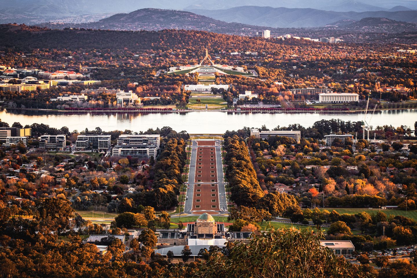 Aerial view of Canberra's Parliamentary Triangle and Lake Burley Griffin in autumn