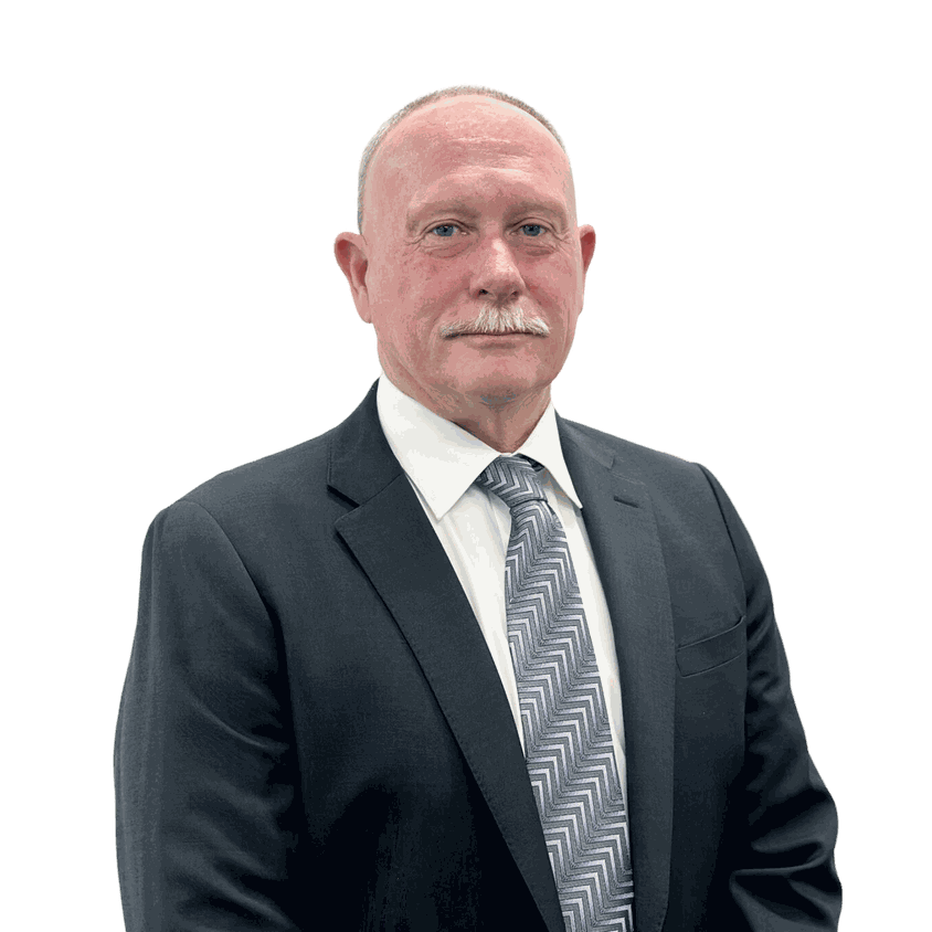 A member of the Master Builders ACT Advisory team in a dark suit and tie.