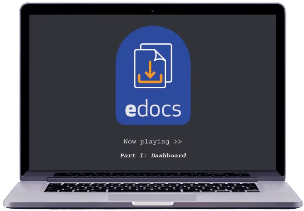 A laptop playing an eDocs tutorial video, "Part 1: Dashboard".